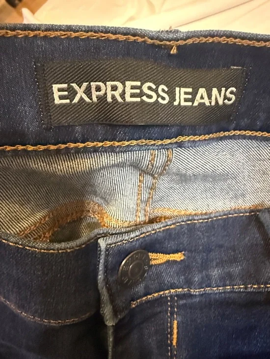 Express Dark Indigo Skinny Jeggings with Distressed Details and Ankle Zippers - Picture 2 of 8